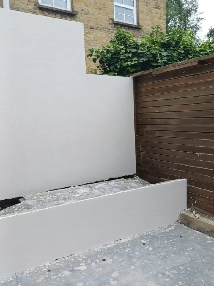 White textured K Rend on an exterior garden wall and planter